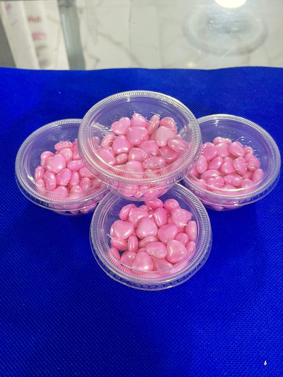 Perlas de corazones rosadas